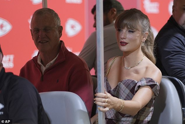 She was joined by her dad Scott Swift