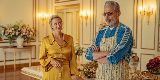 Janet McTeer as Hera and Jeff Goldblum as Zeus, standing in an opulent room in Netflix series Kaos.