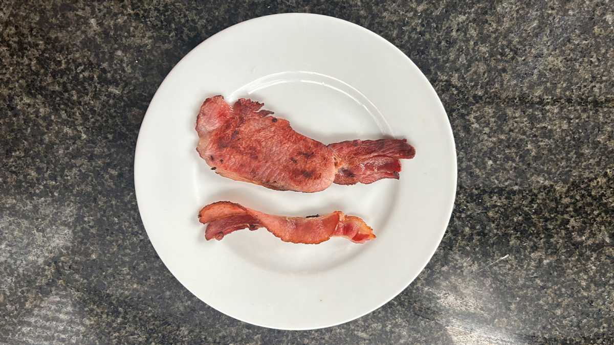 Pan-fried bacon on a plate