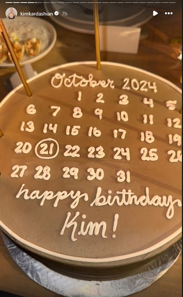 She also posted a photo of her birthday cake which was brown with white icing that made out an October calendar with her birthday, the 21st, circled