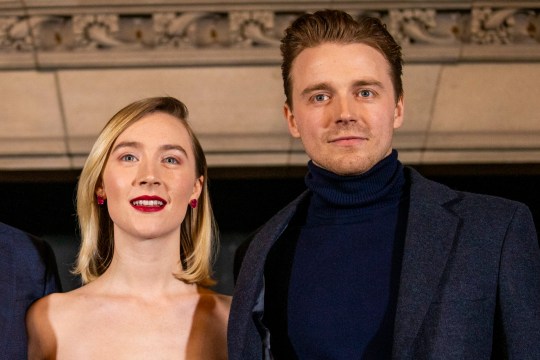 Saoirse Ronan and Jack Lowden pose together as they attend Scotland's Premiere of Mary Queen of Scots in 2019