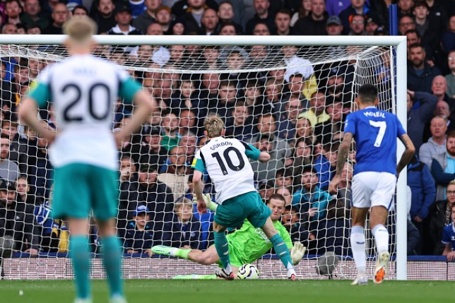 Everton goalkeeper Jordon Pickford saves Anthony Gordon's first-half penalty