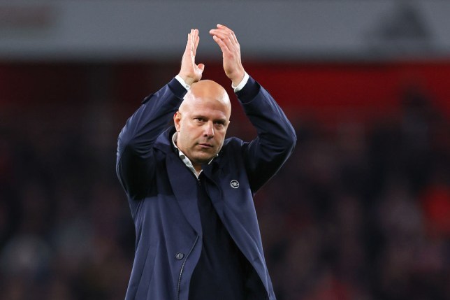 Arne Slot manager / head coach of Liverpool applauds the fans at full time during the Premier League match between Arsenal FC and Liverpool FC 