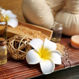 relax-composition-table-against-wooden-background-close-up-less