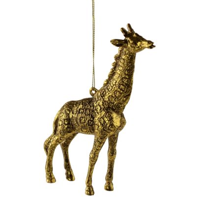 Guldfarvet ornament formet som en giraf.
