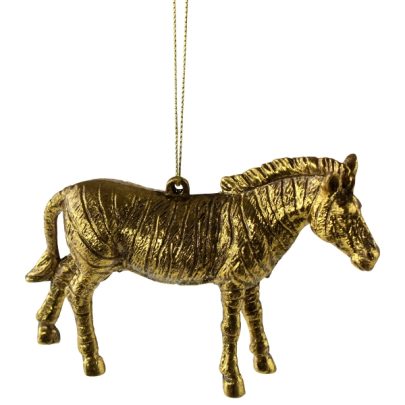 Guldfarvet ornament formet som en zebra.