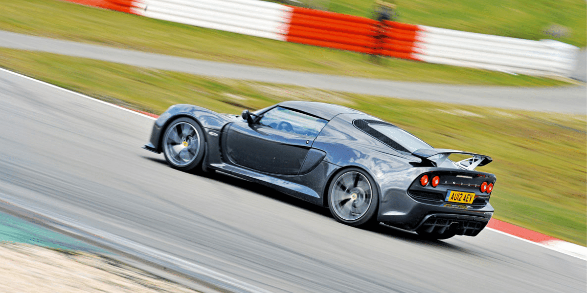 a black sports car on a race track