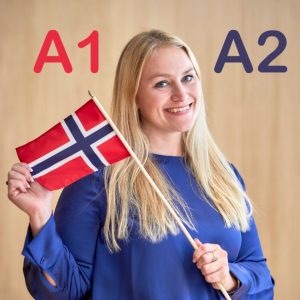 dame som holder norsk flagg. Det står A1 og A2 på veggen bak