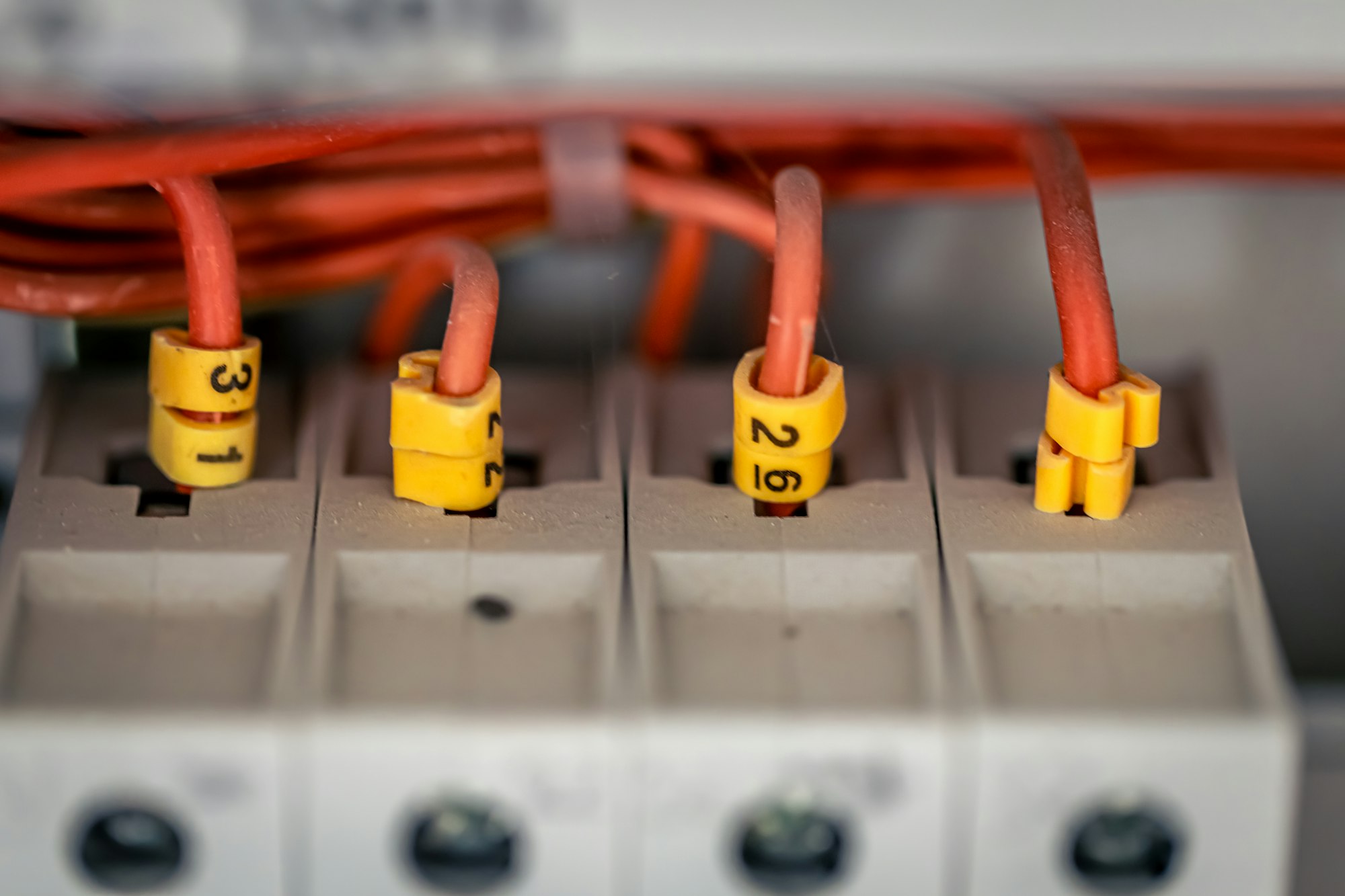 Electrical panel with fuses and contactors, close-up.