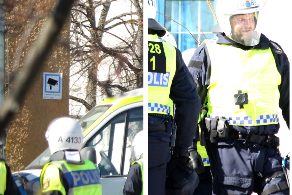 Skylt om övervakning och polis med kroppskamera vid koranbränningen i RInkeby