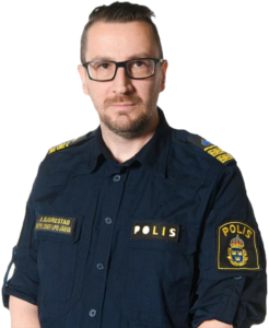 vit man i polisuniform