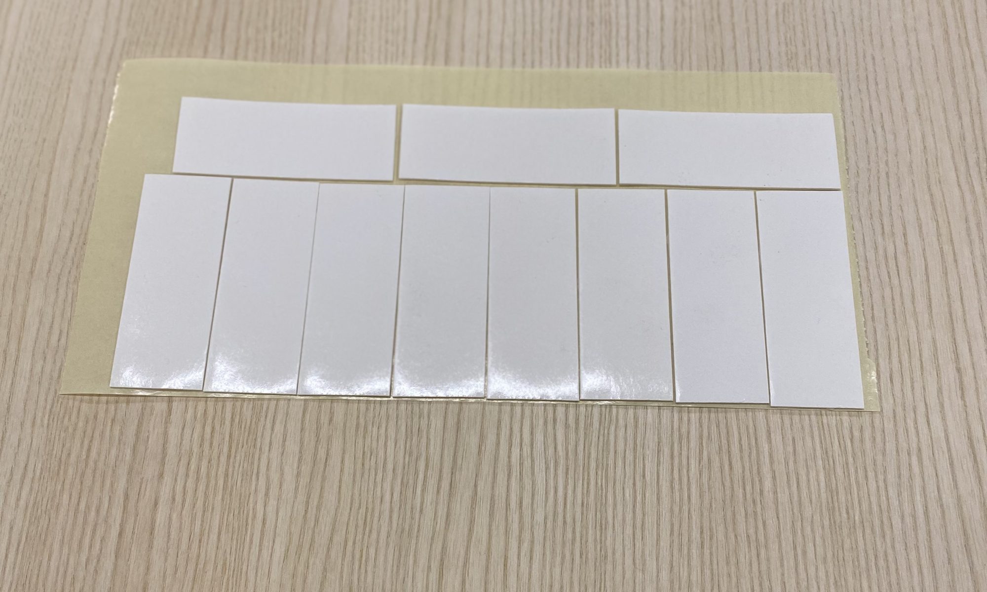 extra adhesive tape on sheet