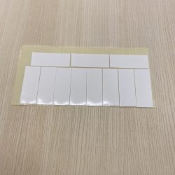 extra adhesive tape on sheet