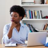 African american businesswoman with depression at office at home