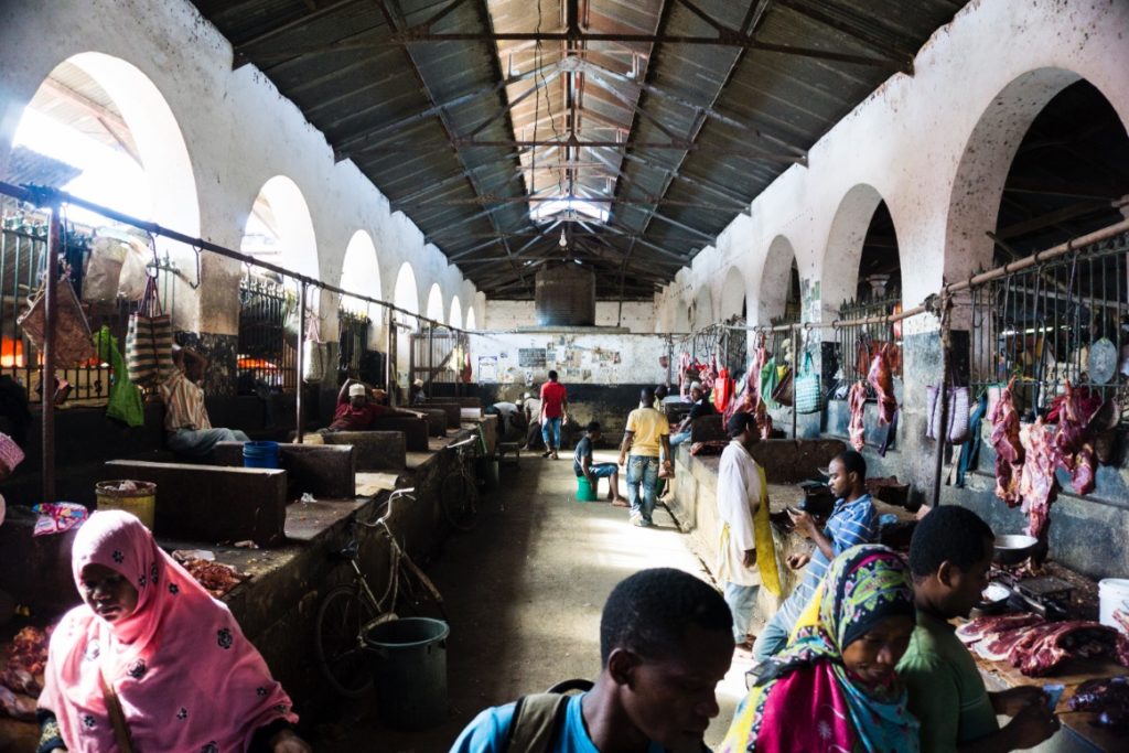 Meat seller on market in Stonetown Zanzibar