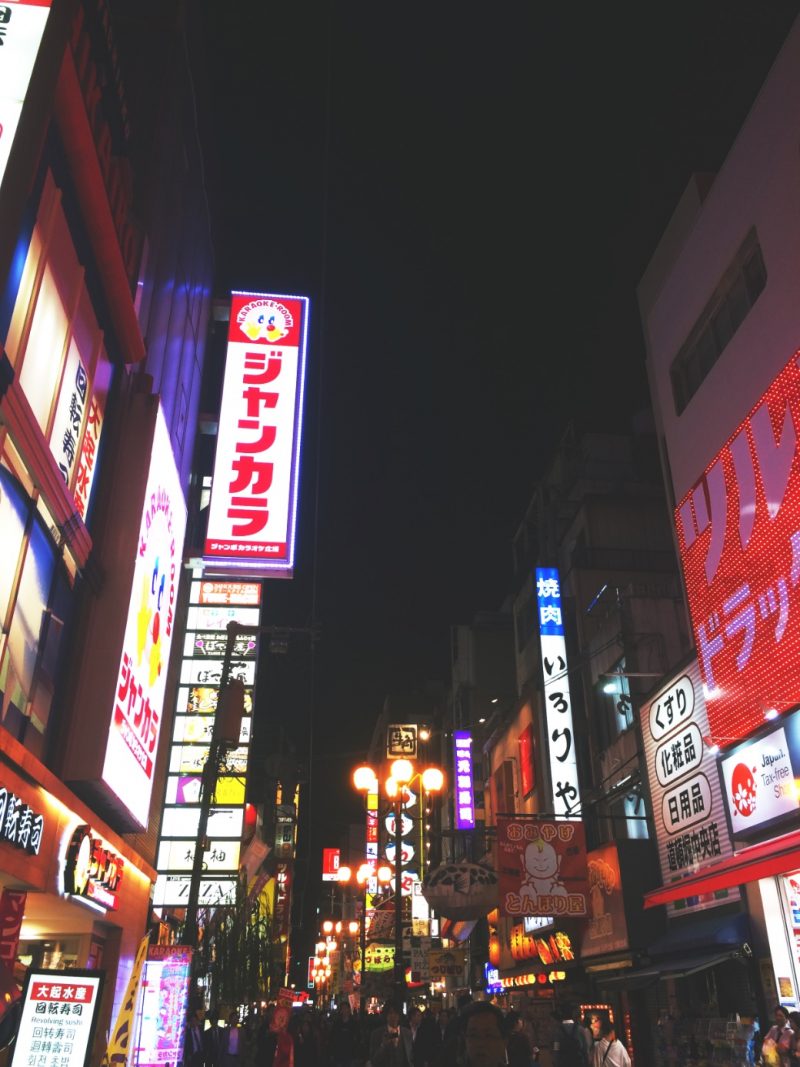 The vibrant atmosphere of Dotonbori street by night in Osaka - Japan