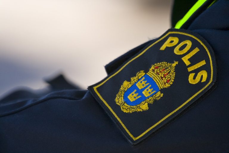 Bild på polisemblem för jacka