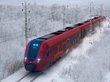 Tåg i vinterlandskap