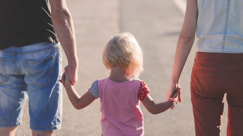 Girl holding hands