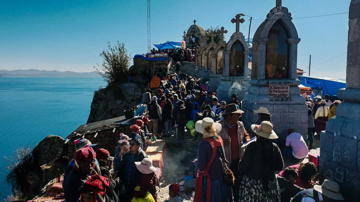 people waiting in line to honor the virgen in Copacabana Bolivia
