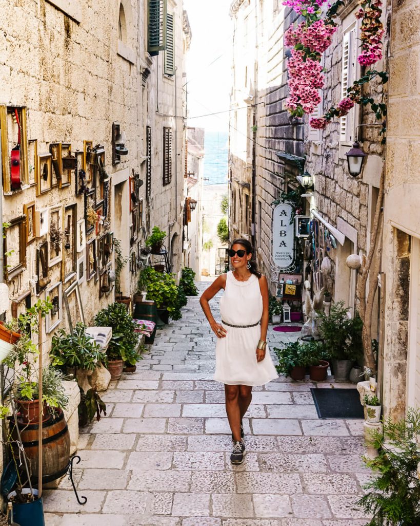 Deborah in medieval streets of Kocrula town along the Dalmatian coast