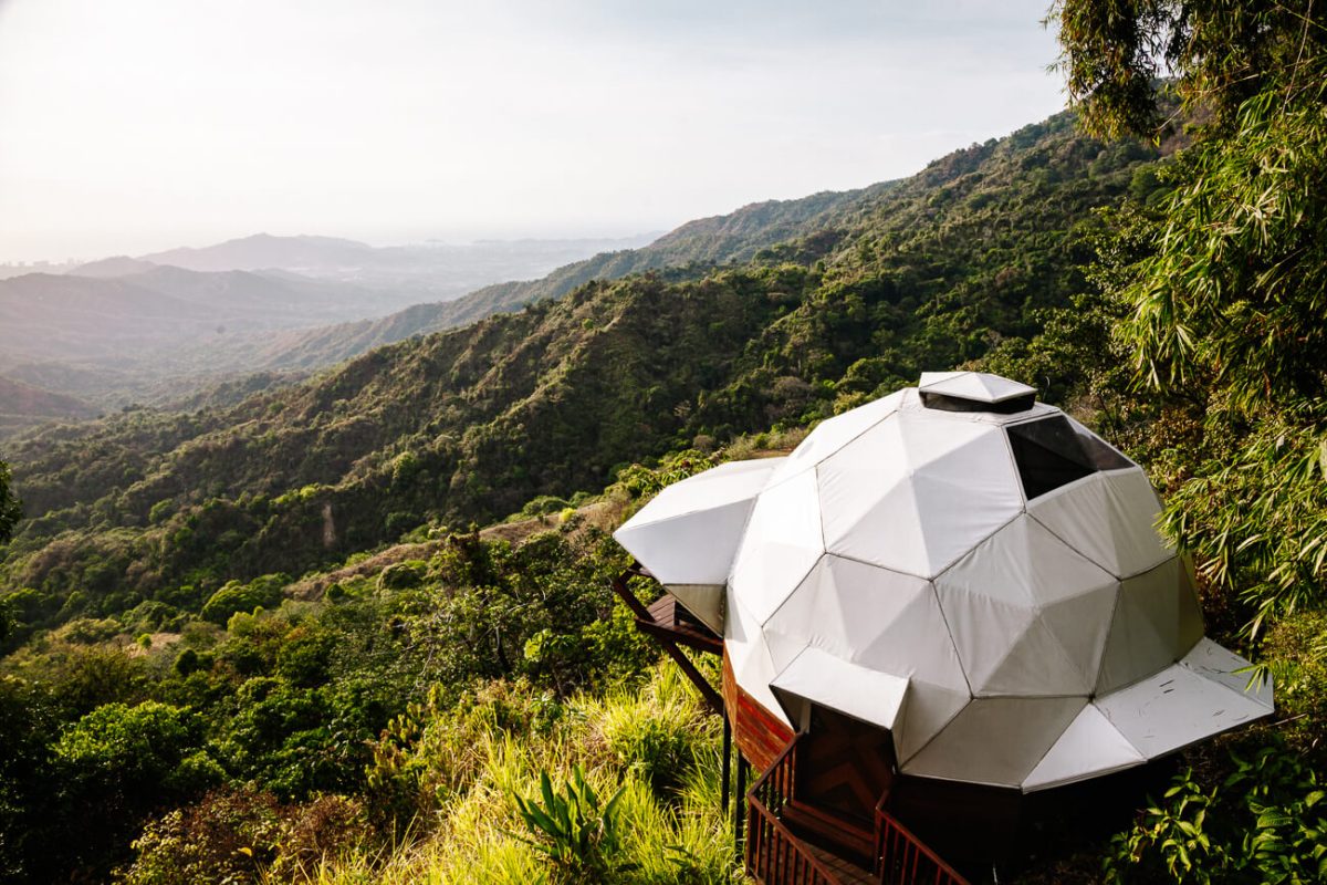 white domes with view of green jungle at Trekker Glamping Minca in Colombia