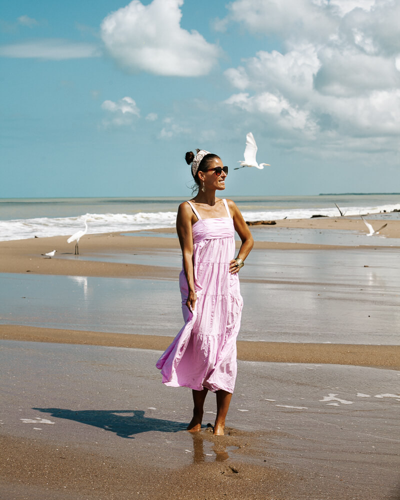 Deborah at the beach in La Guajira Colombia, next to the Cienaga de Mababita, a lagoon where numerous bird species gather due to the large amount of fish. 