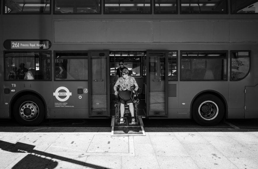 Jamie Hale using public transport - getting off a London bus