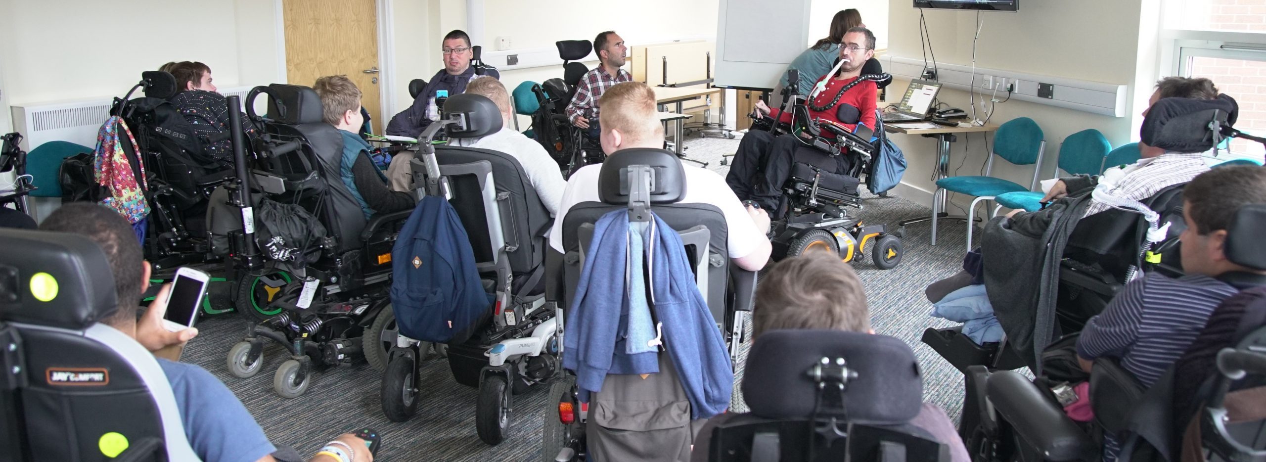 A group of Pathfinders members at a conference