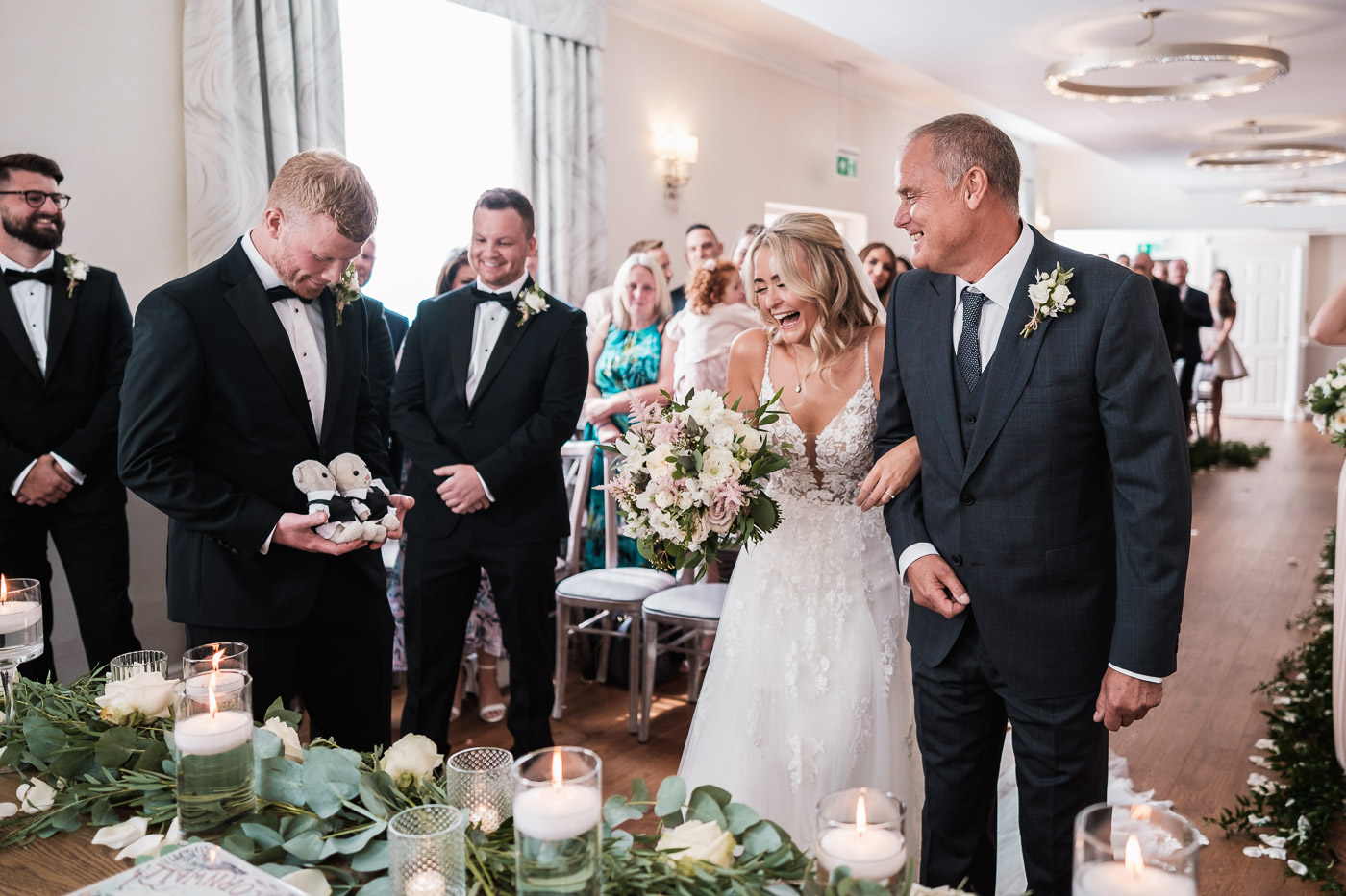 groom presents teddies to the bride at their old palace Chester ceremony