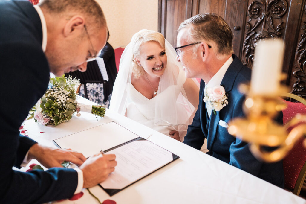 The wedding schedule is signed at Walton hall