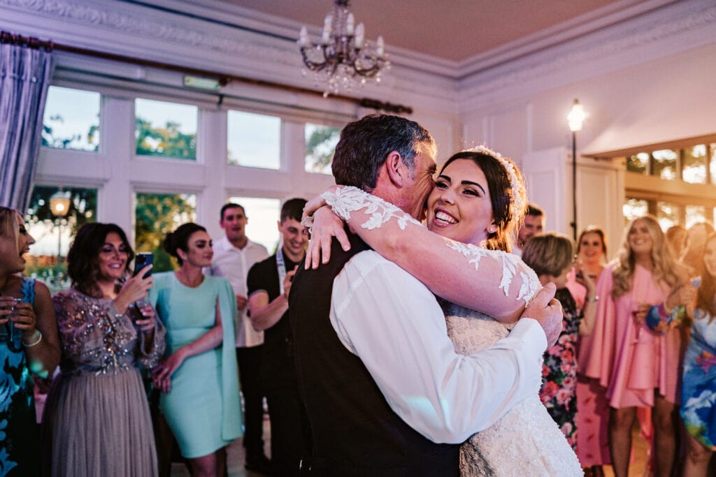 bride dancing with her dad during her west tower wedding reception