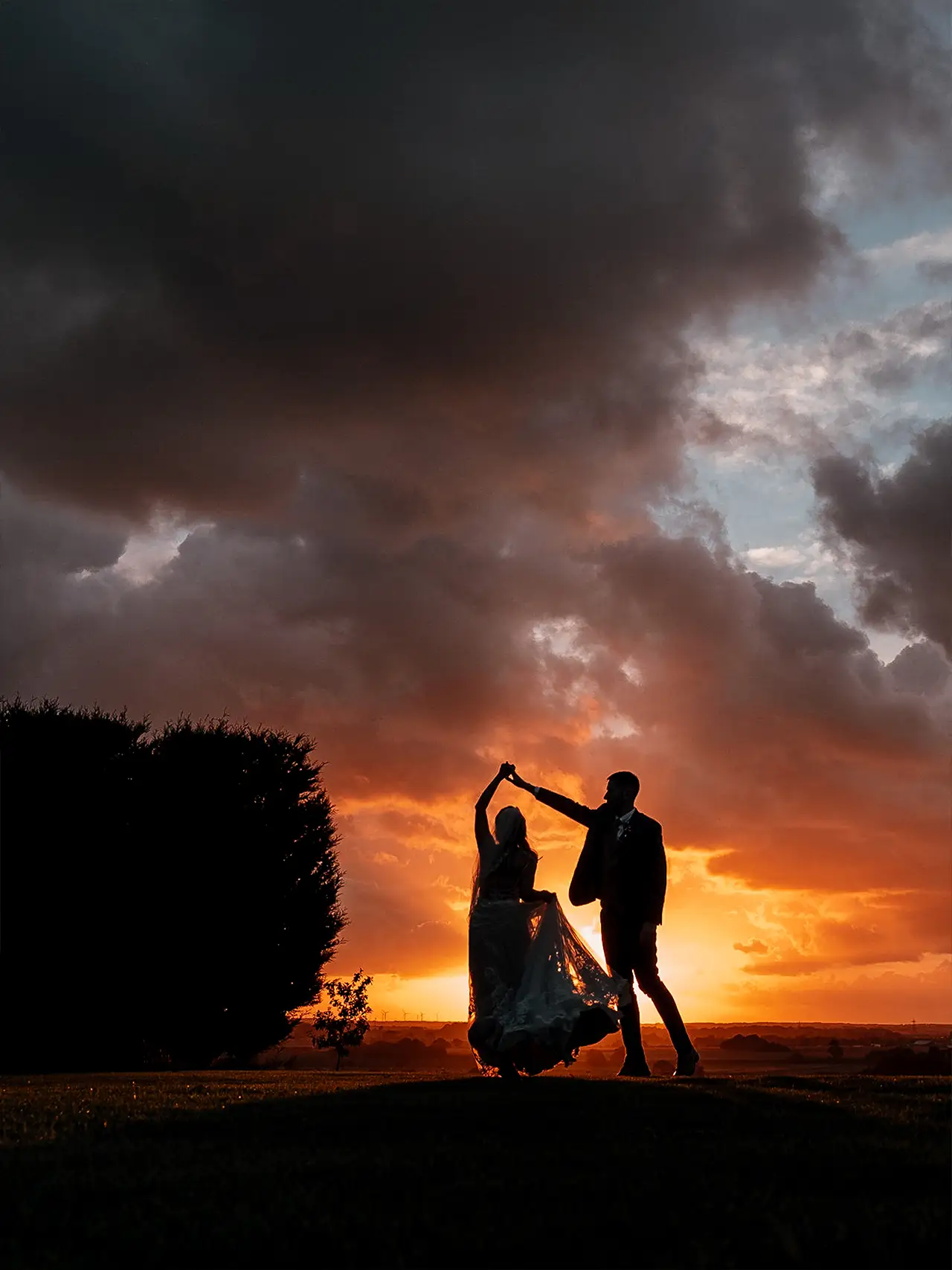 couple at sunset in a west tower wedding