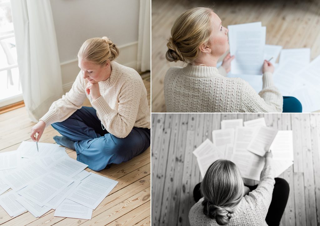 "three photos of a writer sitting on the floor with the manuscript of the book she is writing taken by Janine Laag"