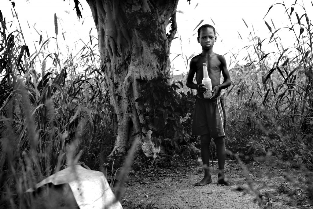 Boy and Chicken - Ghana