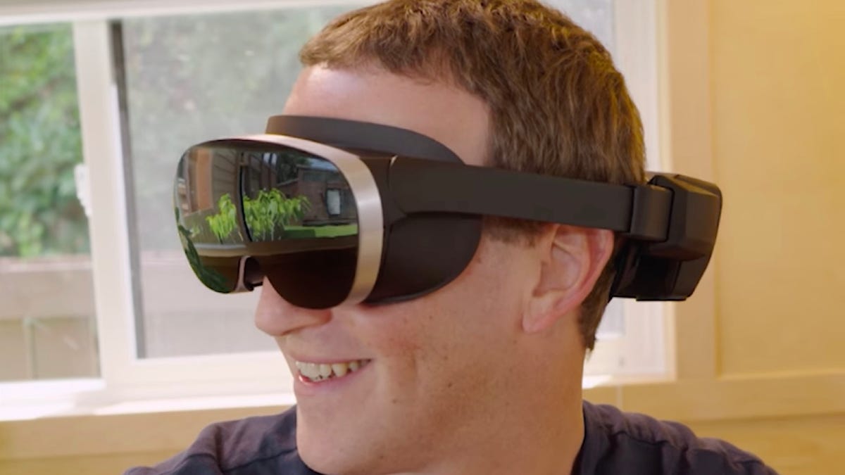 Mark Zuckerberg wearing a VR headset prototype