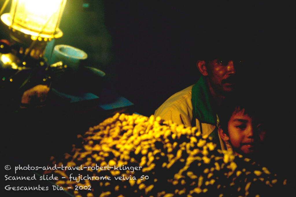 A father and his son on the market in Bukitingi