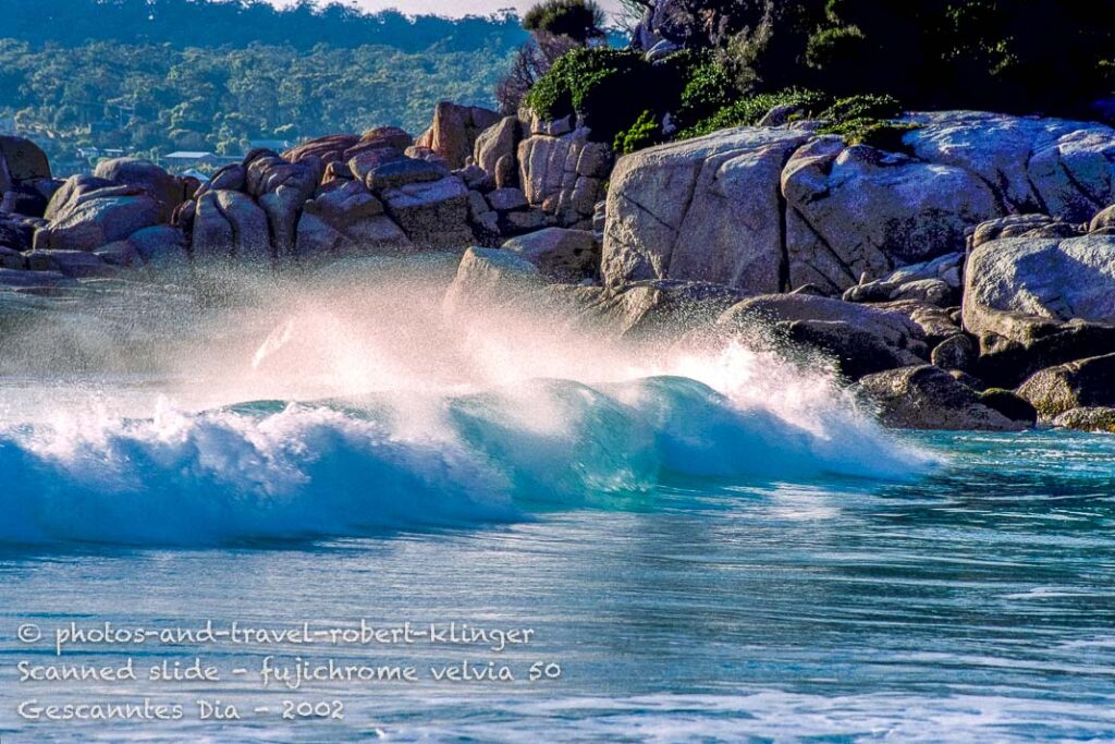 A wave breaking on a beach in eastern Tasmania