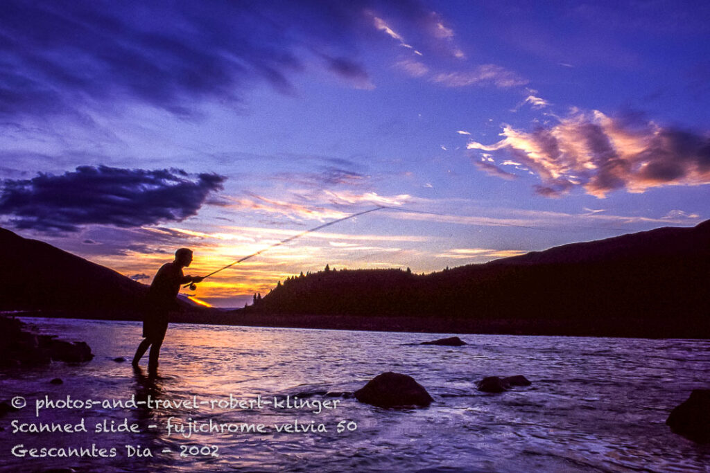 A flyfisherman during sunset on a beautiful South Island river