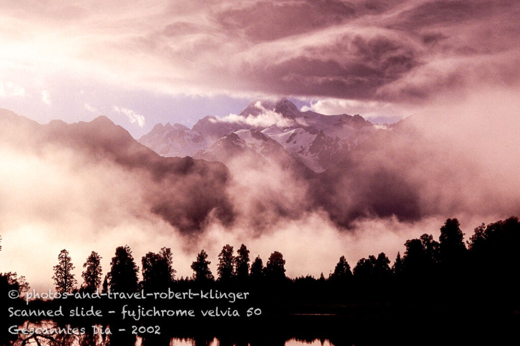 Lake Matheson early Morning with lots of fog and the view on Mt Cook