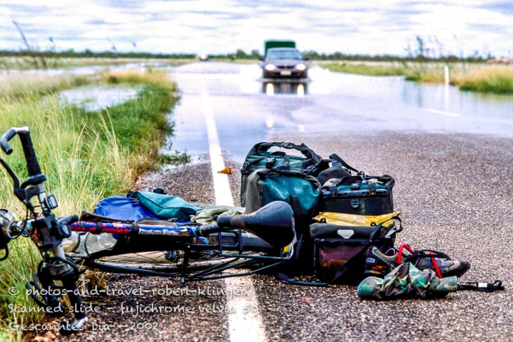 Crossing a flood in Australia by bicycle