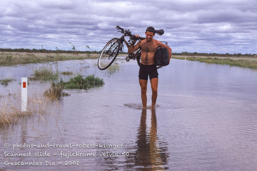 Carrying my gear trough a flood during the rain-season in the northern territory