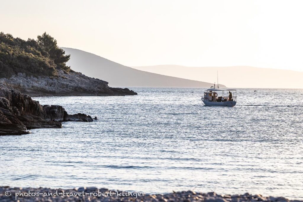 A fishing boat on the mediteranean sea on a early morning in Croatia