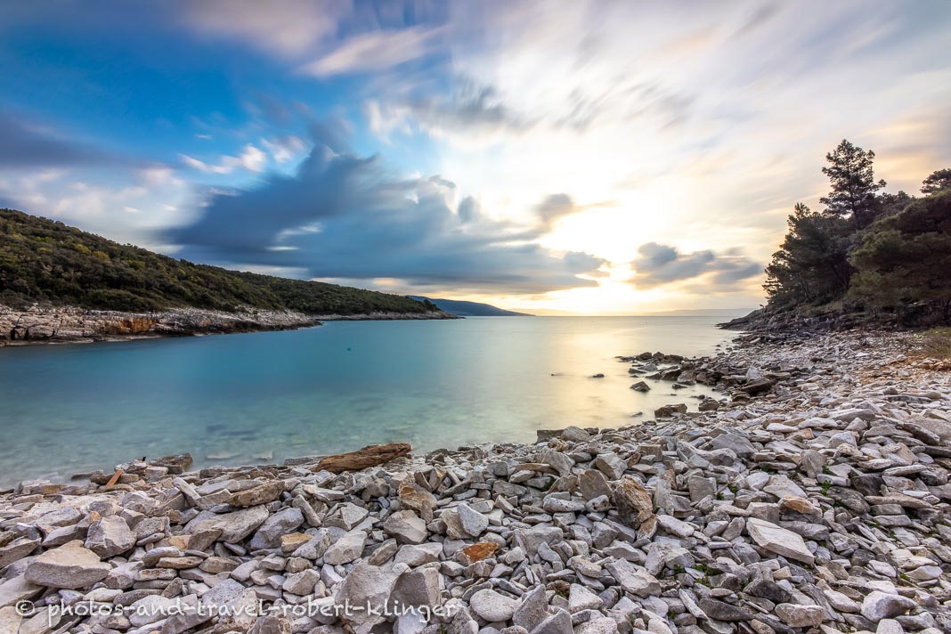 Sunrise at a stony beach in Istria in Croatia