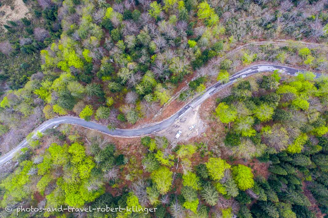 Aerial photo of a street through a forest in Plitvice Lakes National Park, Croatia