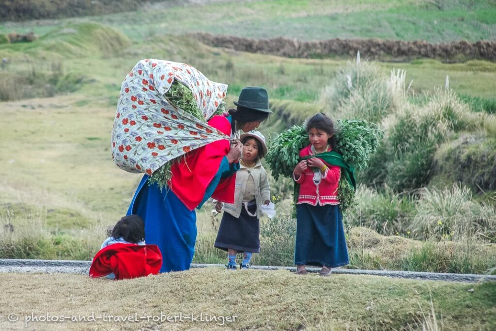 A mother in Peru with her tw daughters