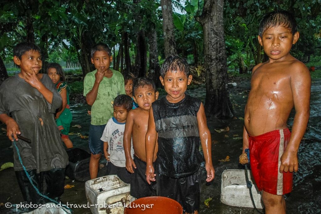 Grouph photo of children in Panama in the rain