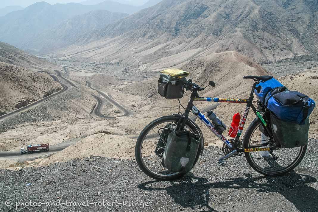 A bicycle on a very long and steep road in Peru