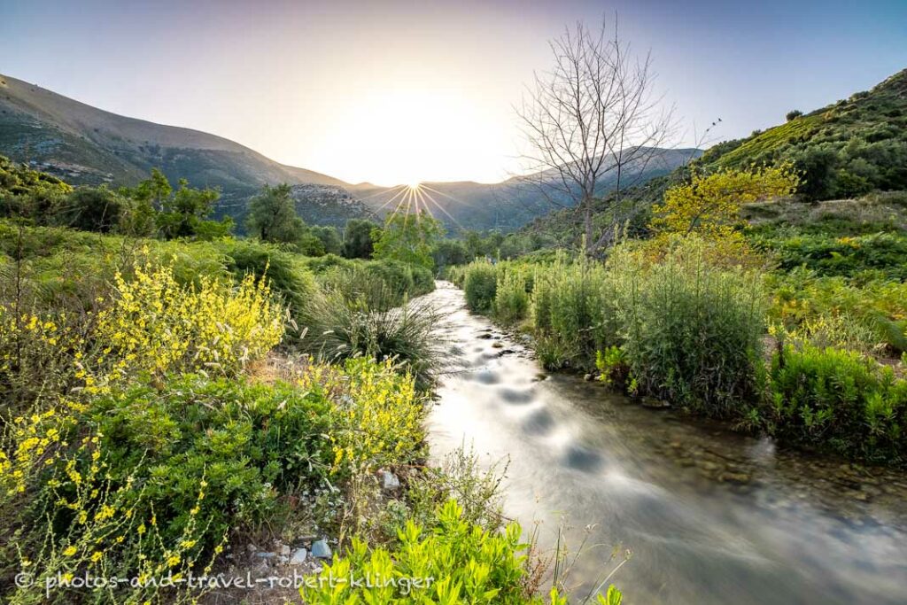 Sunrise over a stream in Albania