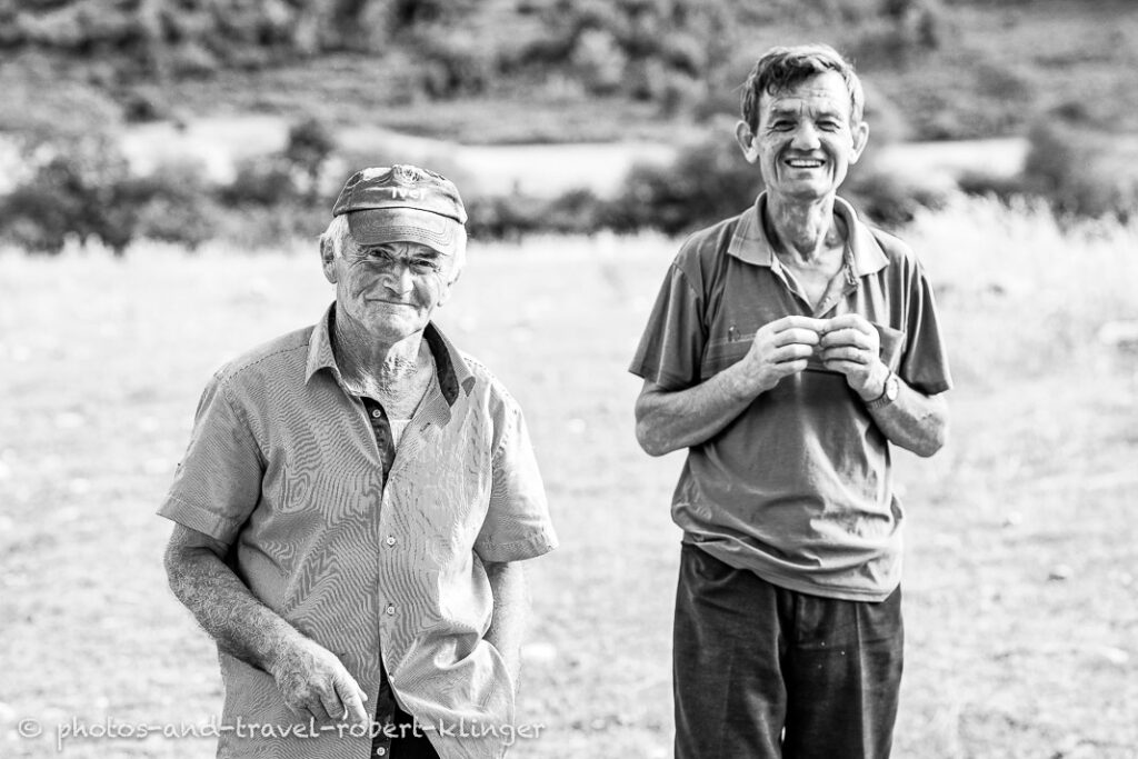 Two men on a field in Albania, black and white photo